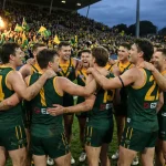 Australia national team celebrates victory with fans in stadium, World Cup football atmosphere