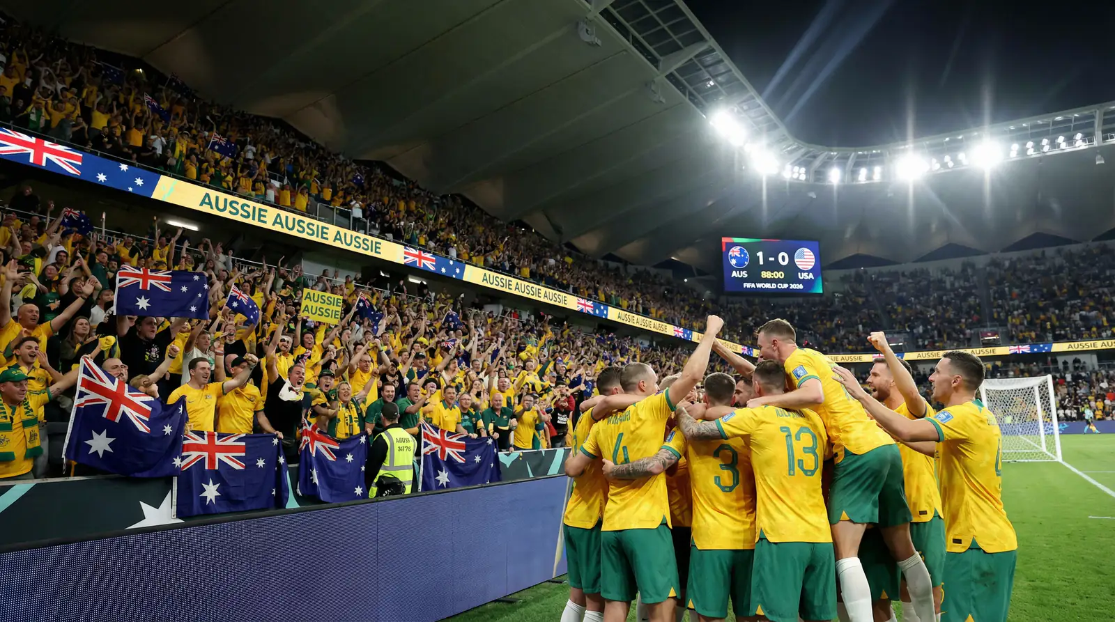 Socceroos players celebrating at the 2026 World Cup in North America