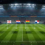 World Cup stadium with group stage flags England Croatia Ghana Panama on pitch