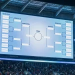 World Cup knockout stage bracket scoreboard in stadium showing tournament finals layout